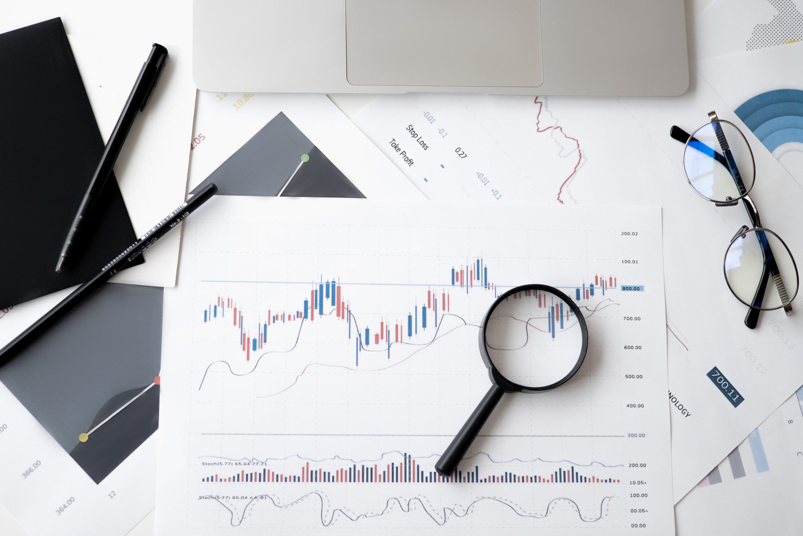 Magnifying glass on a financial chart