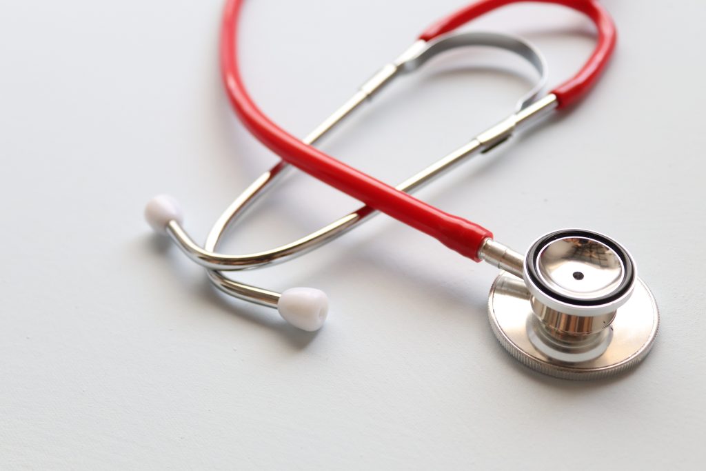 Stethoscope on white table